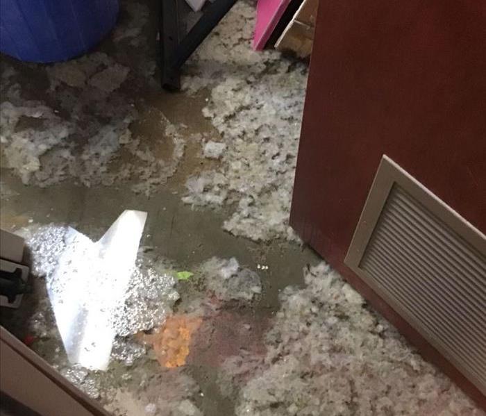Drying equipment placed in room and sewage damage on floor