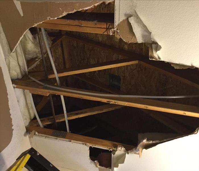 Hole in ceiling drywall