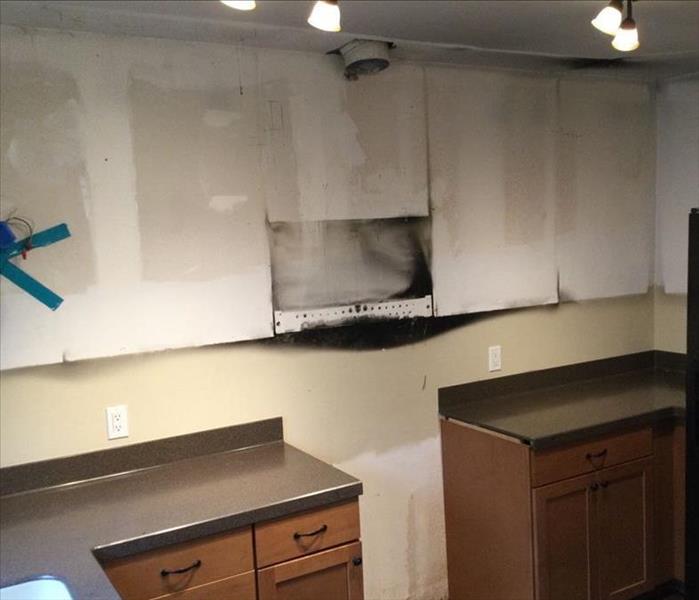 kitchen fire, removed cabinets and stove top, fire damage restoration